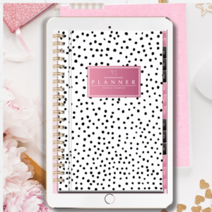 a digital planner with a black and white spotted cover and pink and black hyperlinked tabs with gold spiral binding.